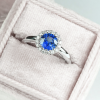 blue sapphire and diamond halo engagement ring