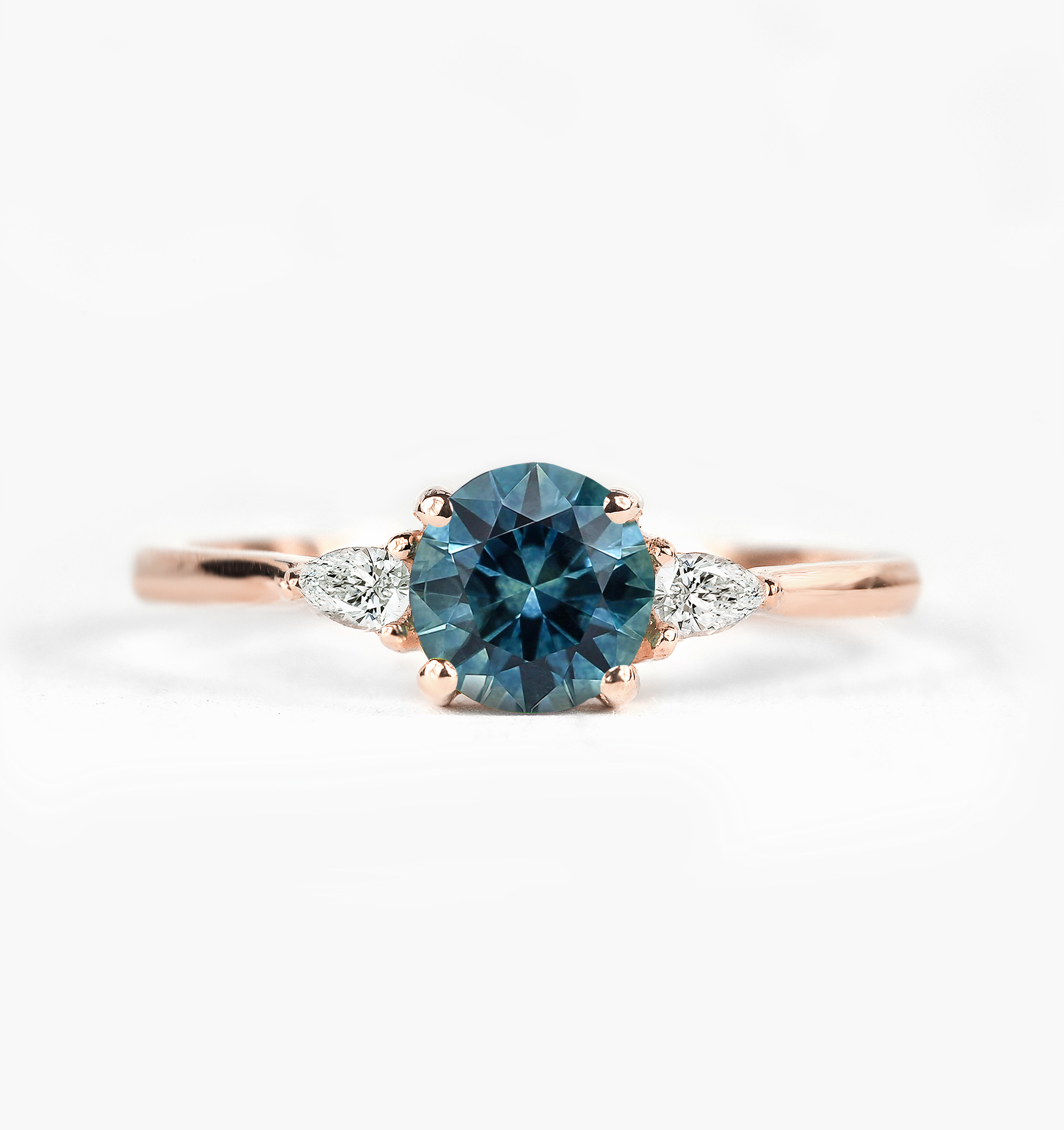 Teal Sapphire engagement ring in three stones ring setting blue green sapphire