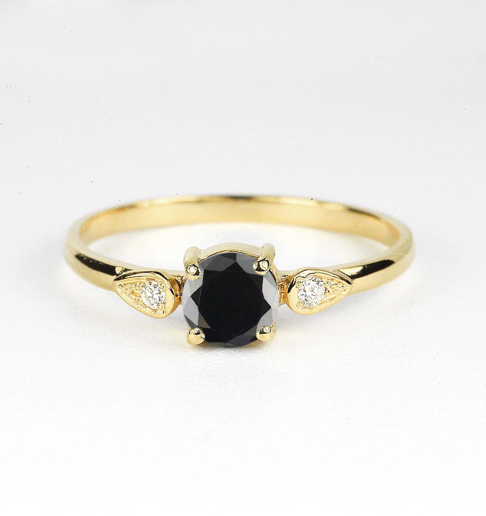 black diamond three stones ring