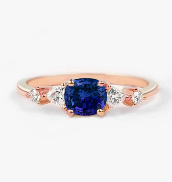 cushion cut blue sapphire celebrity ring with diamonds