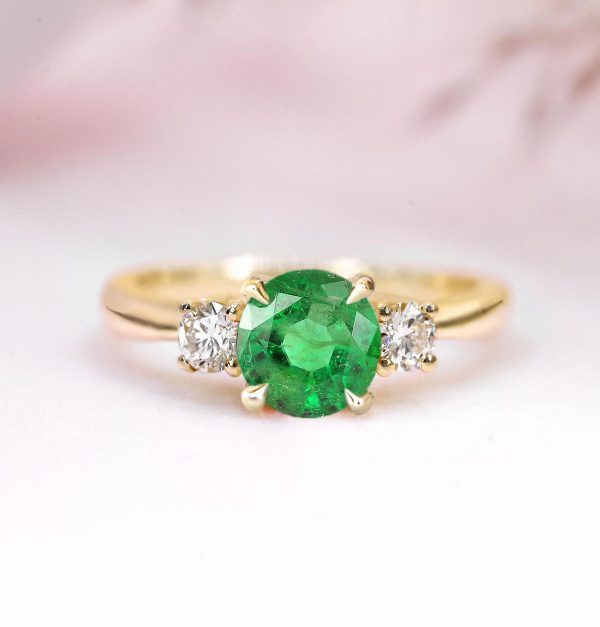 emerald three stones ring