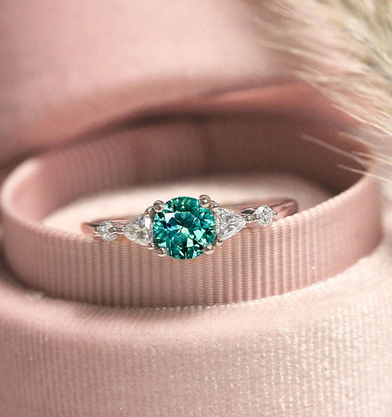 mint green celebrity ring