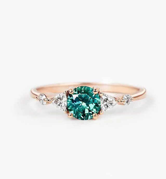 mint green celebrity ring
