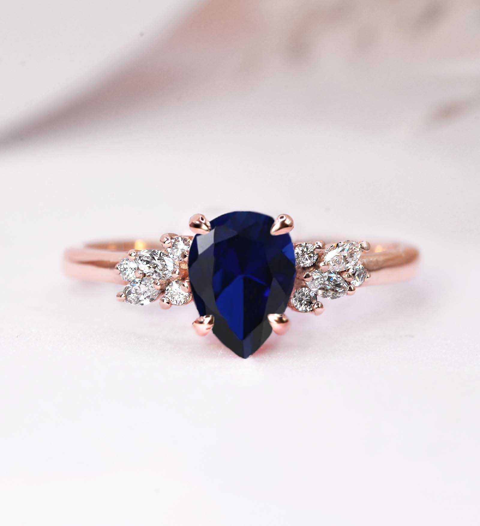 pear dark blue sapphire ring