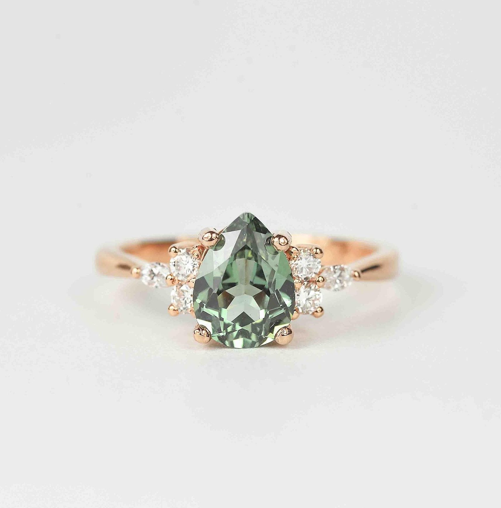 pear mint green sapphire ring