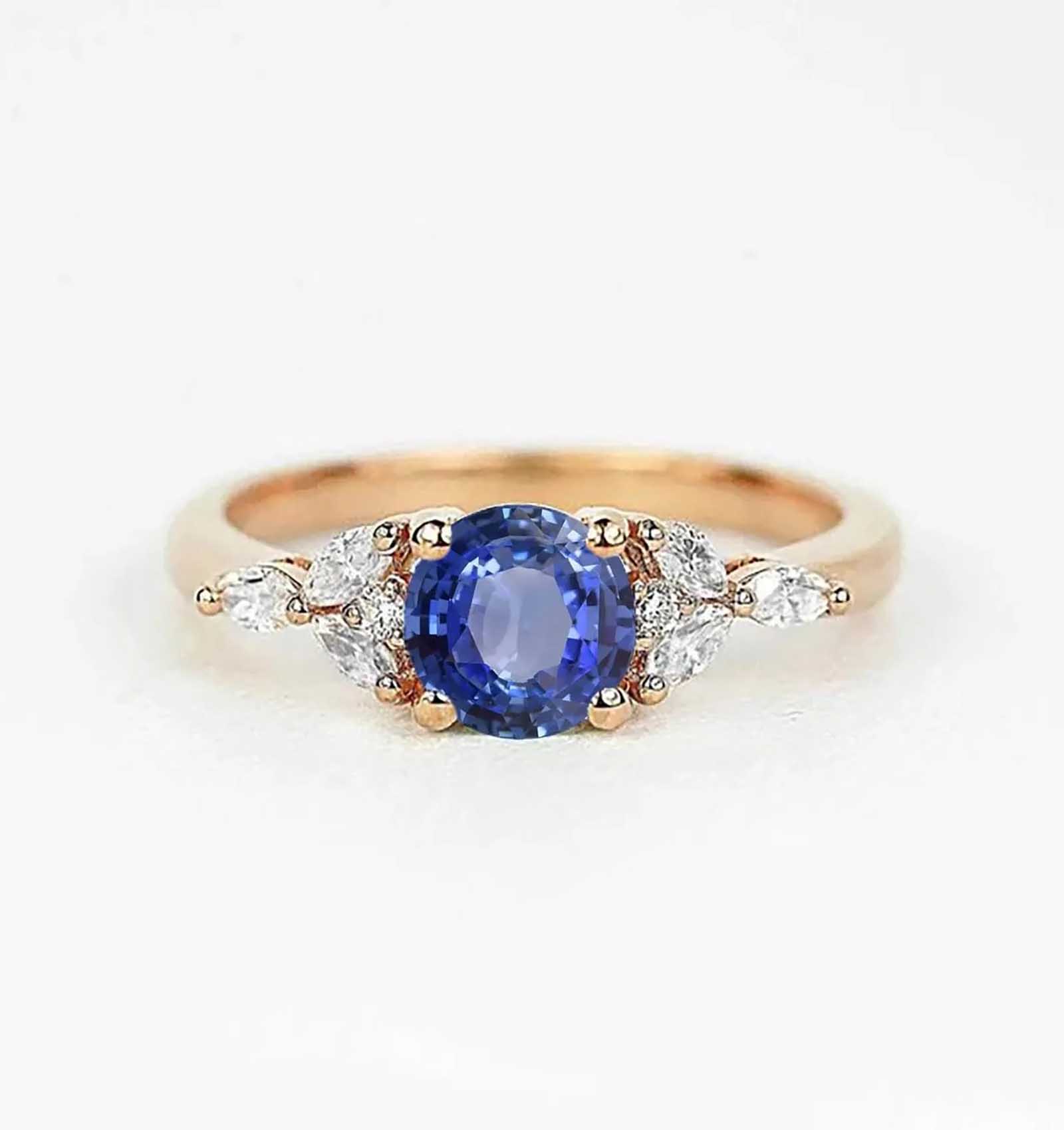 round cut light blue sapphire ring