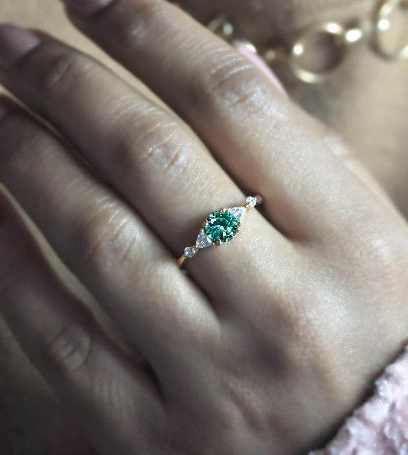 mint green celebrity ring