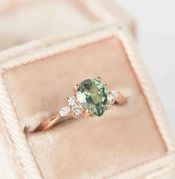pear mint green sapphire ring