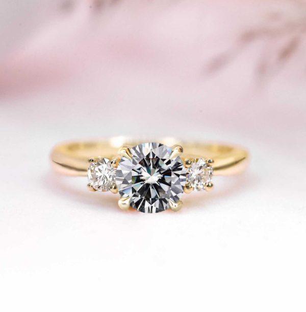 white moissanite featuring ring