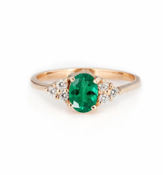oval emerald bespoke ring