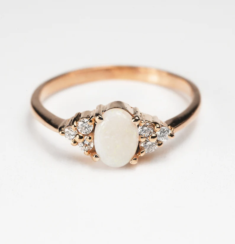 oval white opal bespoke ring