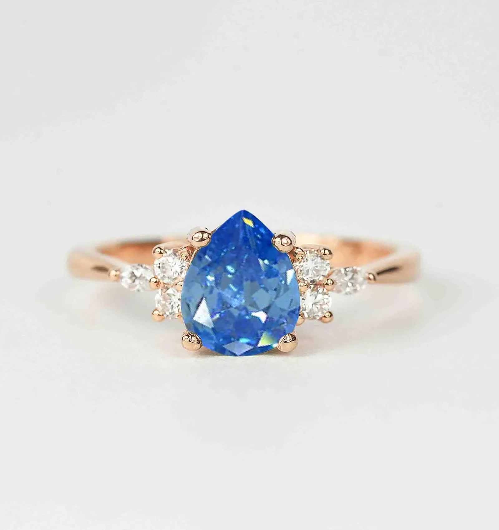 pear-cut-light-blue-sapphire-ring for her