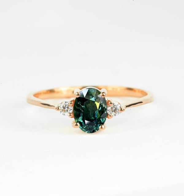 teal featuring three stones ring in rose gold