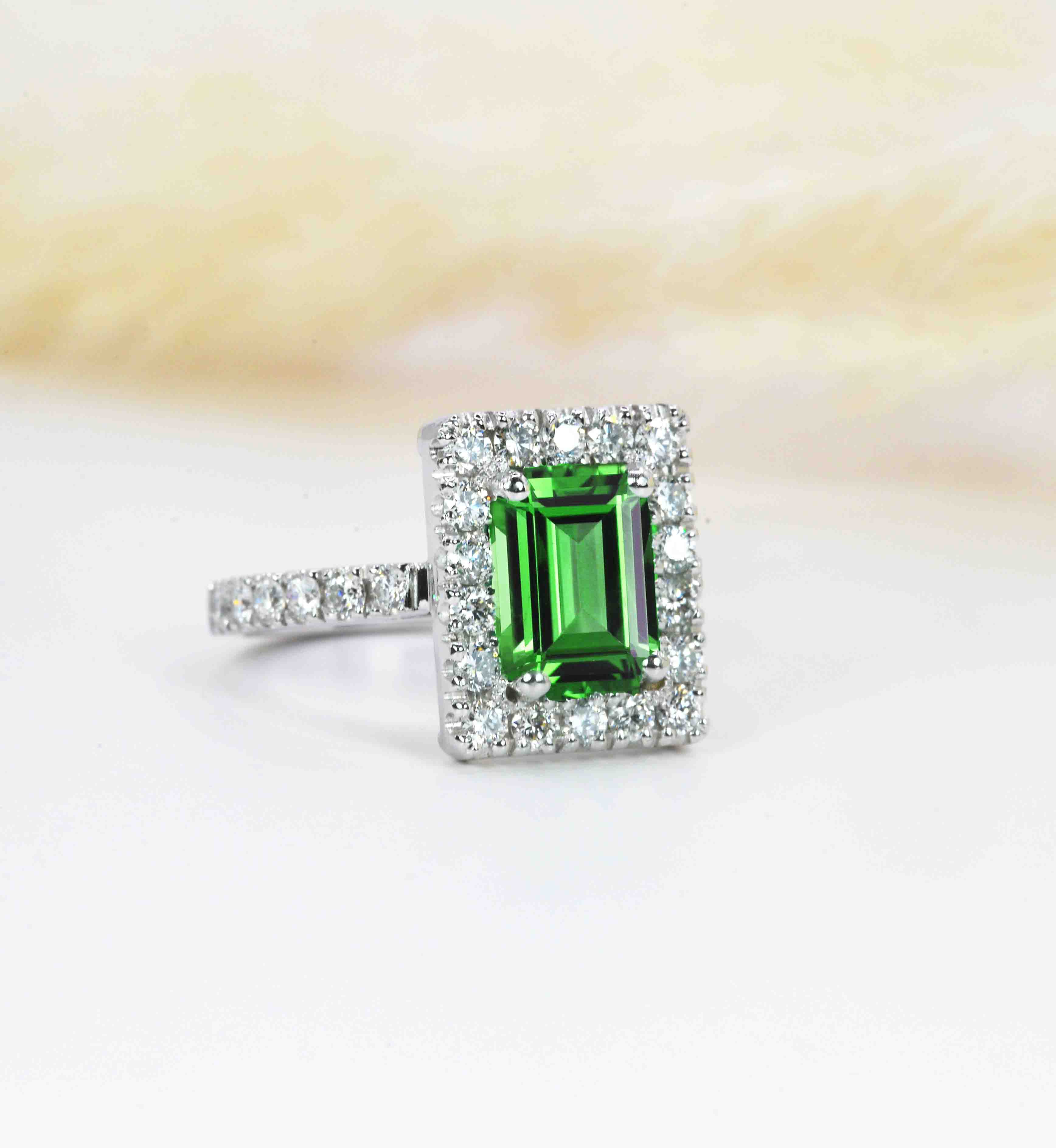 Emerald cut green tsavorite ring for her