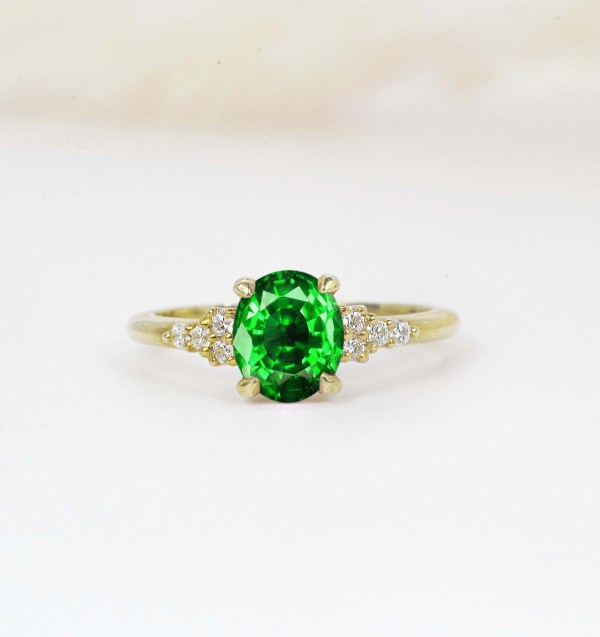 oval green tsavorite engagement ring