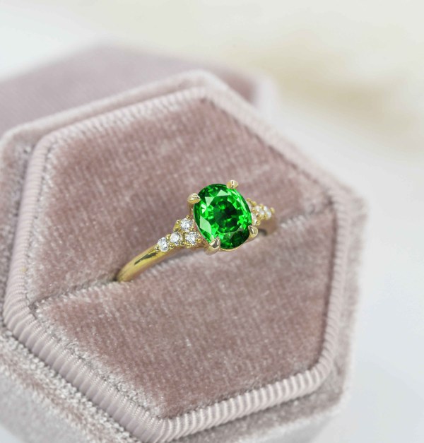 oval green tsavorite engagement ring