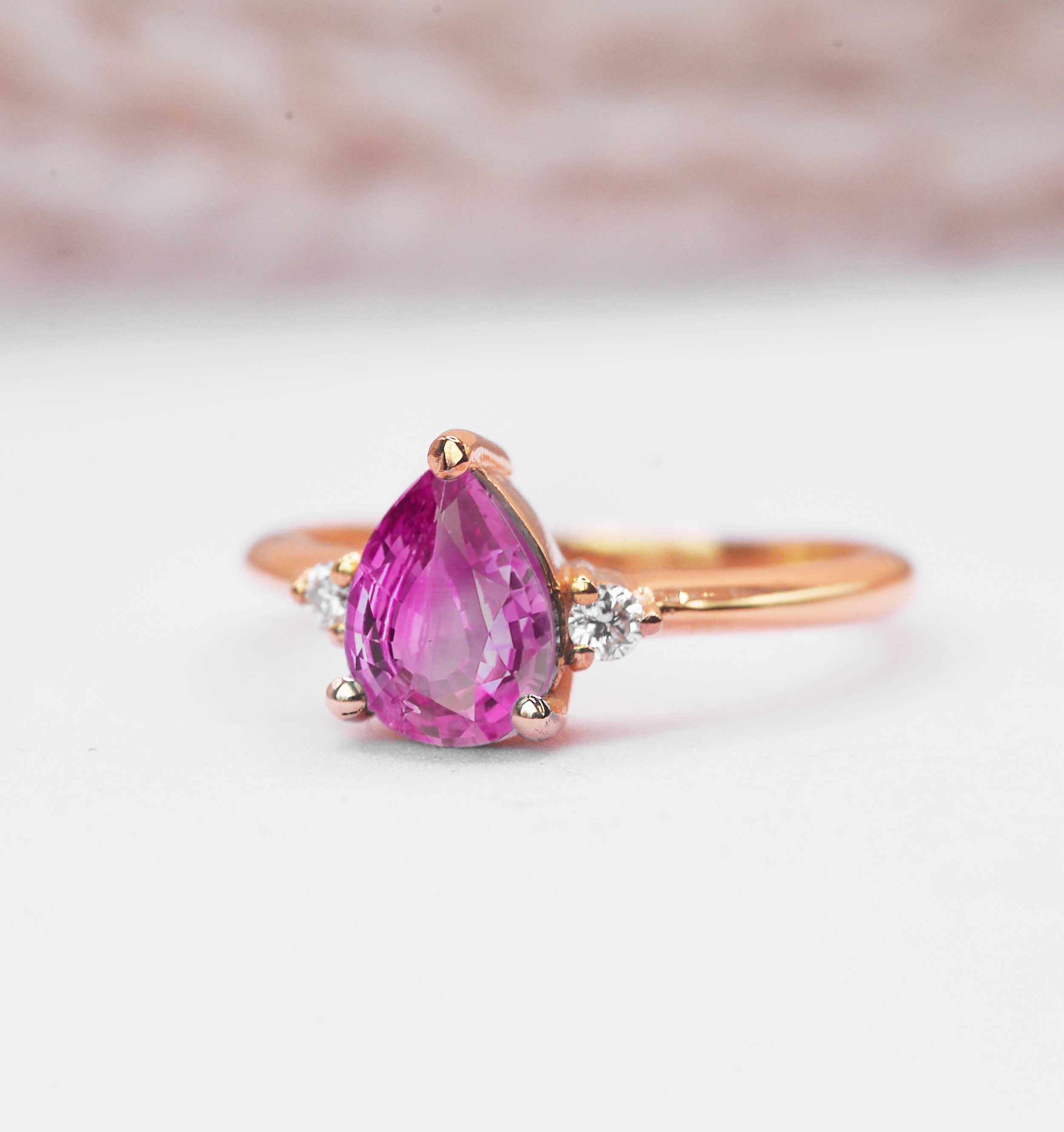 pear pink sapphire ring in minimal Style - DIORAH JEWELLERS pear pink sapphire ring in minimal Style - DIORAH JEWELLERS