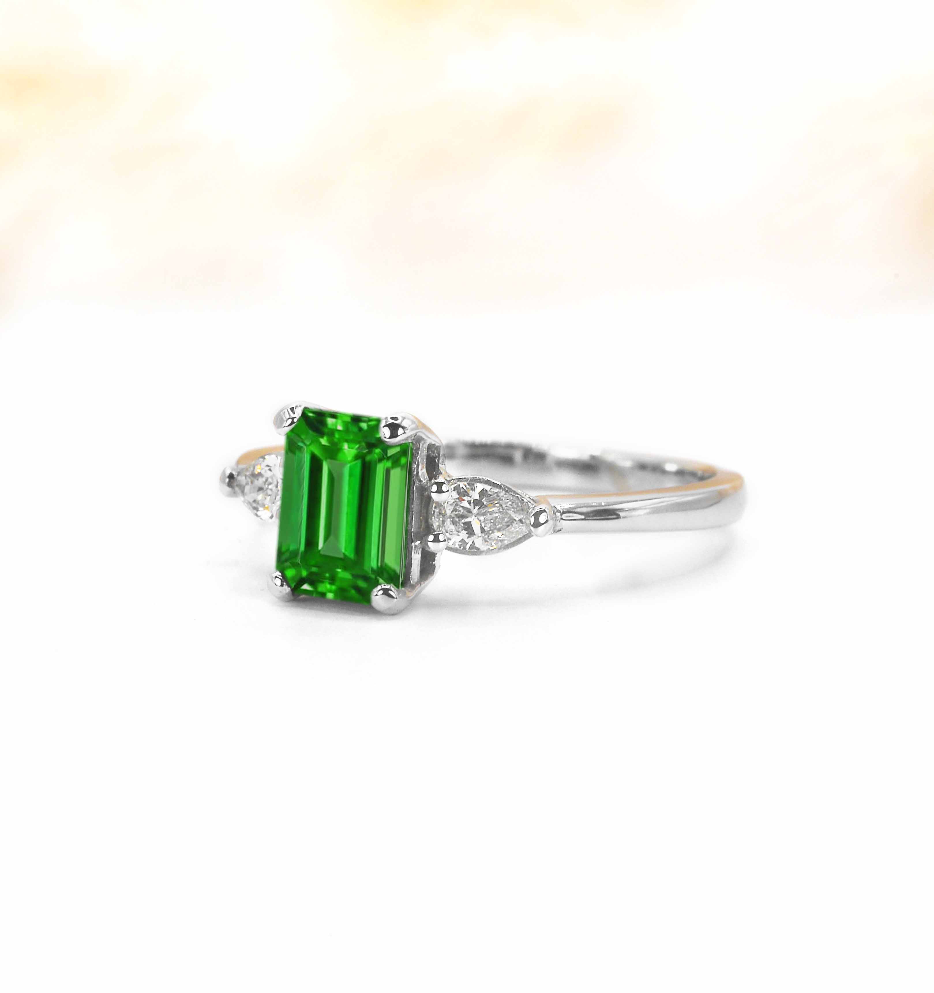 art deco green tsavorite and pear diamond bridal ring