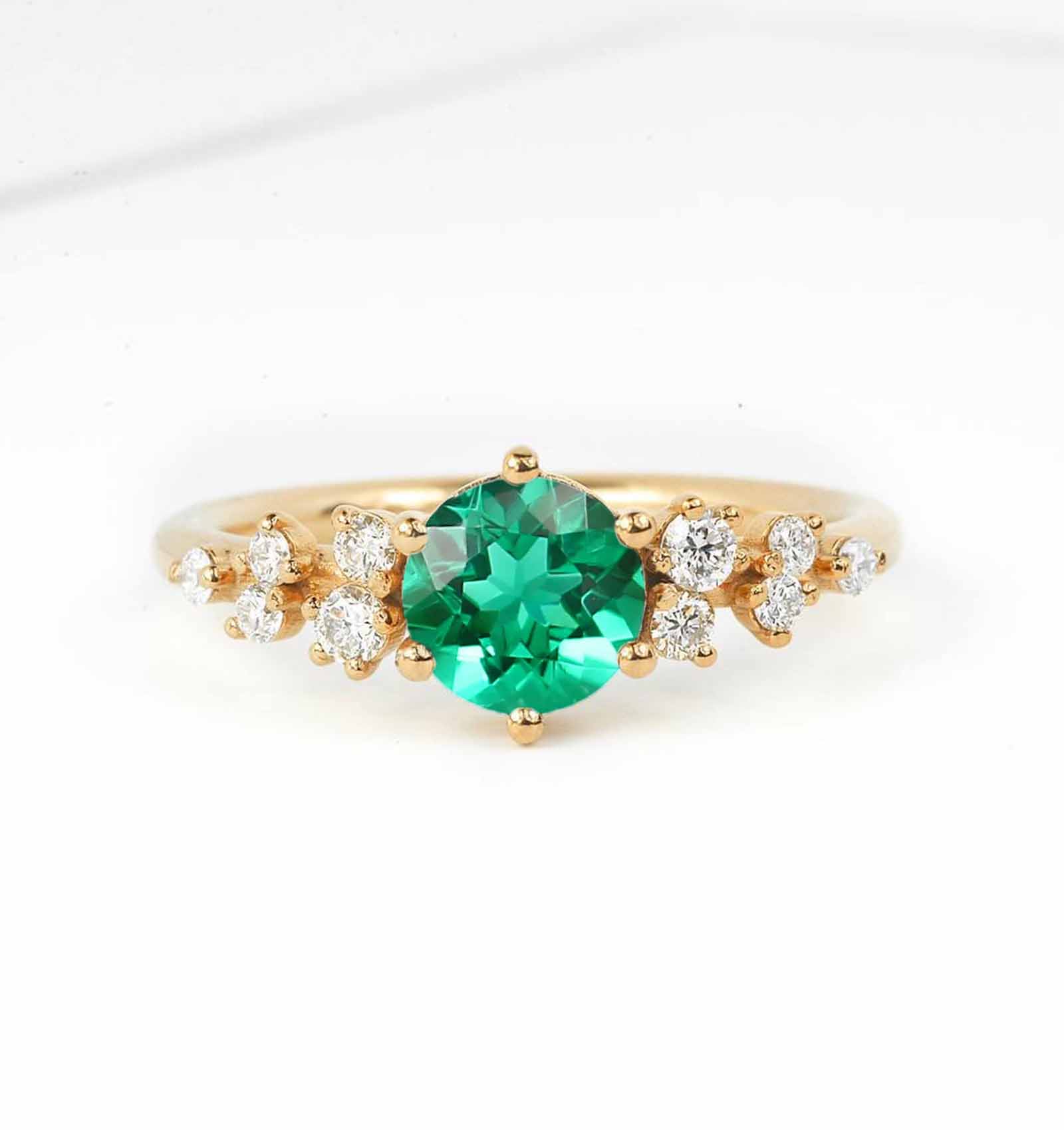 emerald cluster ring for her