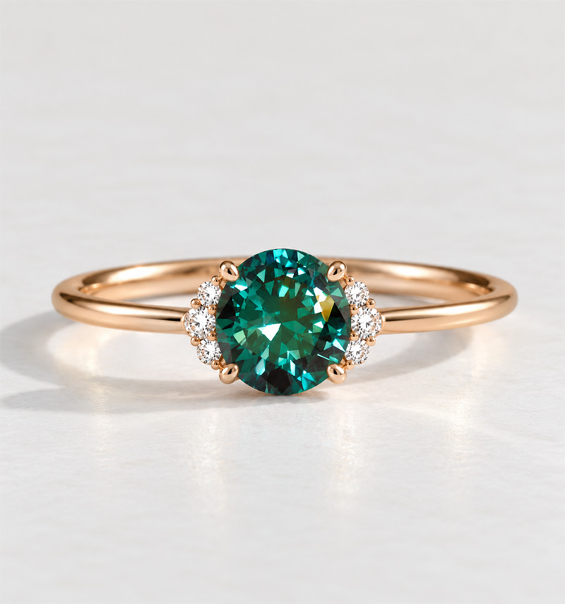 round lab grown teal sapphire engagement ring