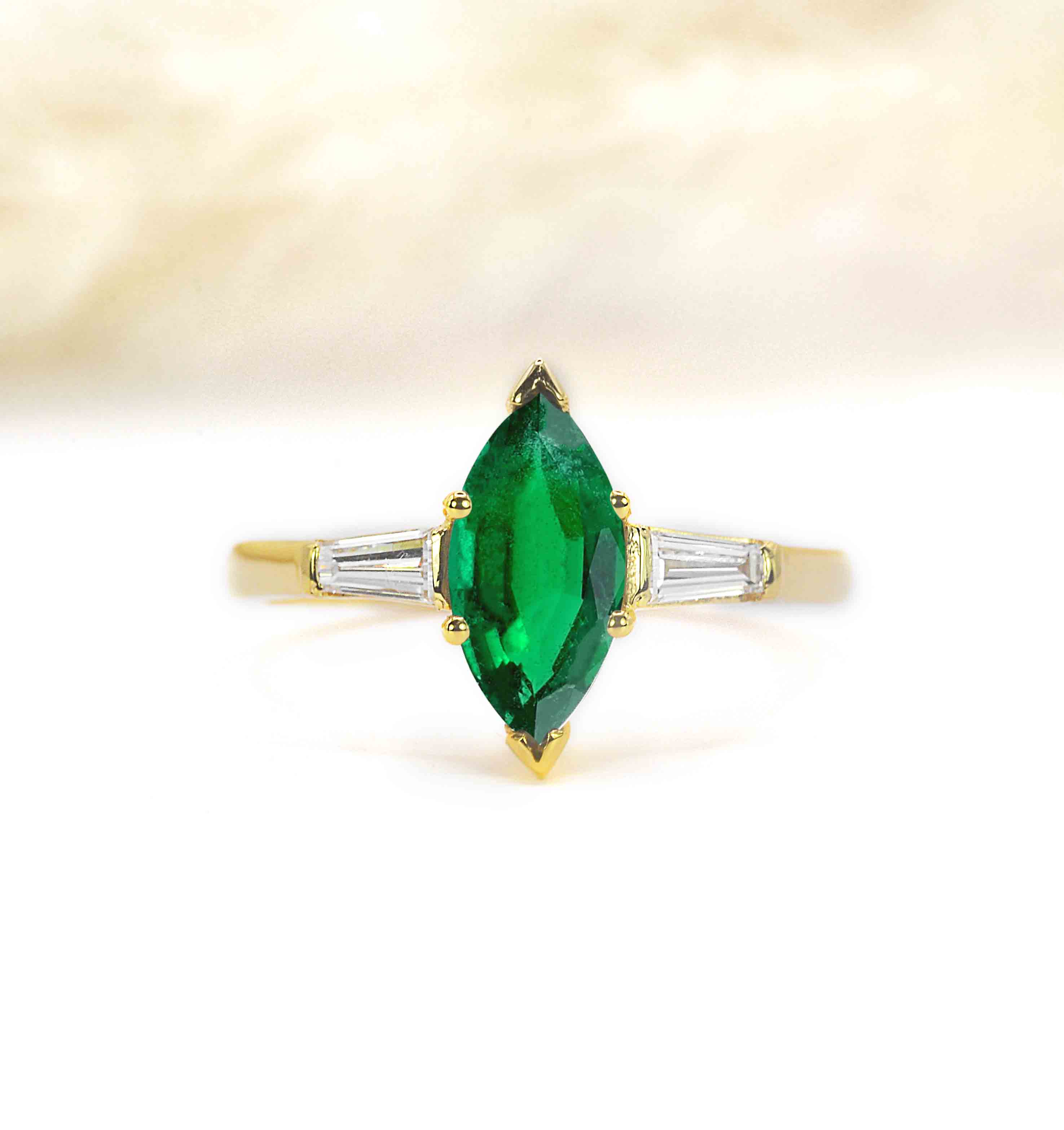 marquise emerald and baguette diamond bridal ring