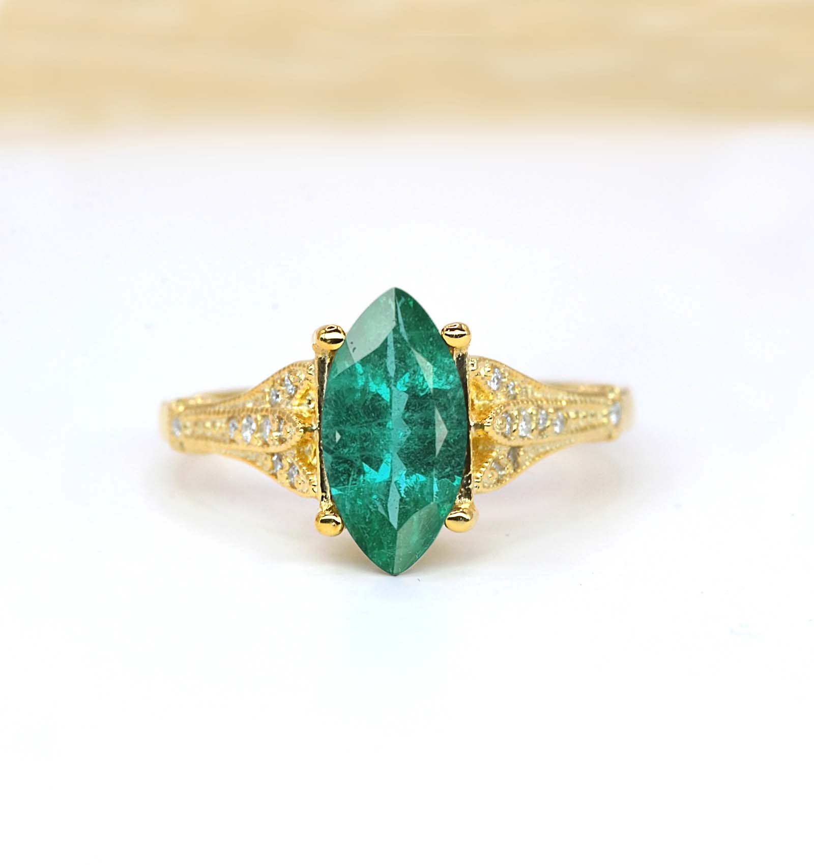 marquise emerald classic bespoke engagement ring