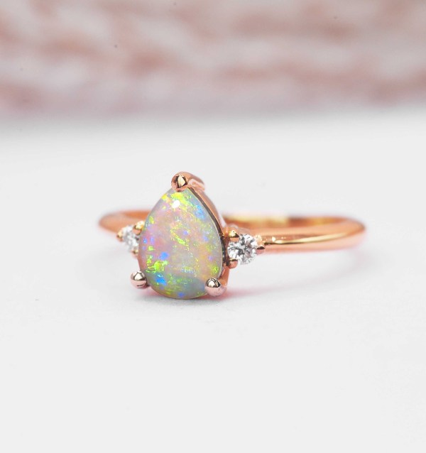white opal threestones ring