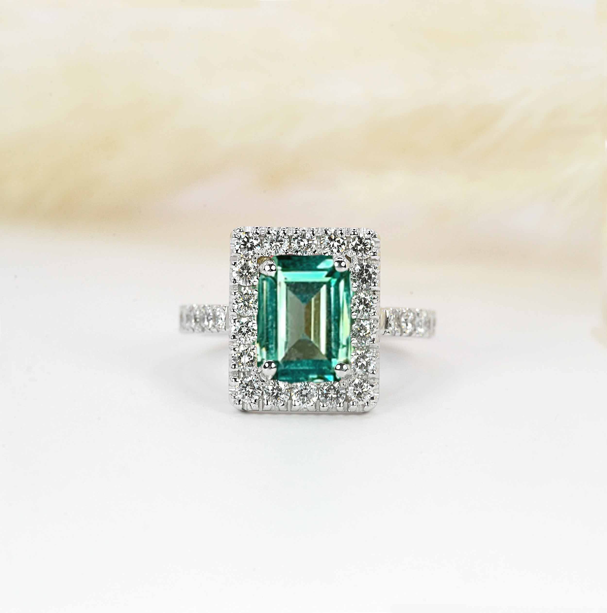dainty emerald cut mint green sapphire cluster ring