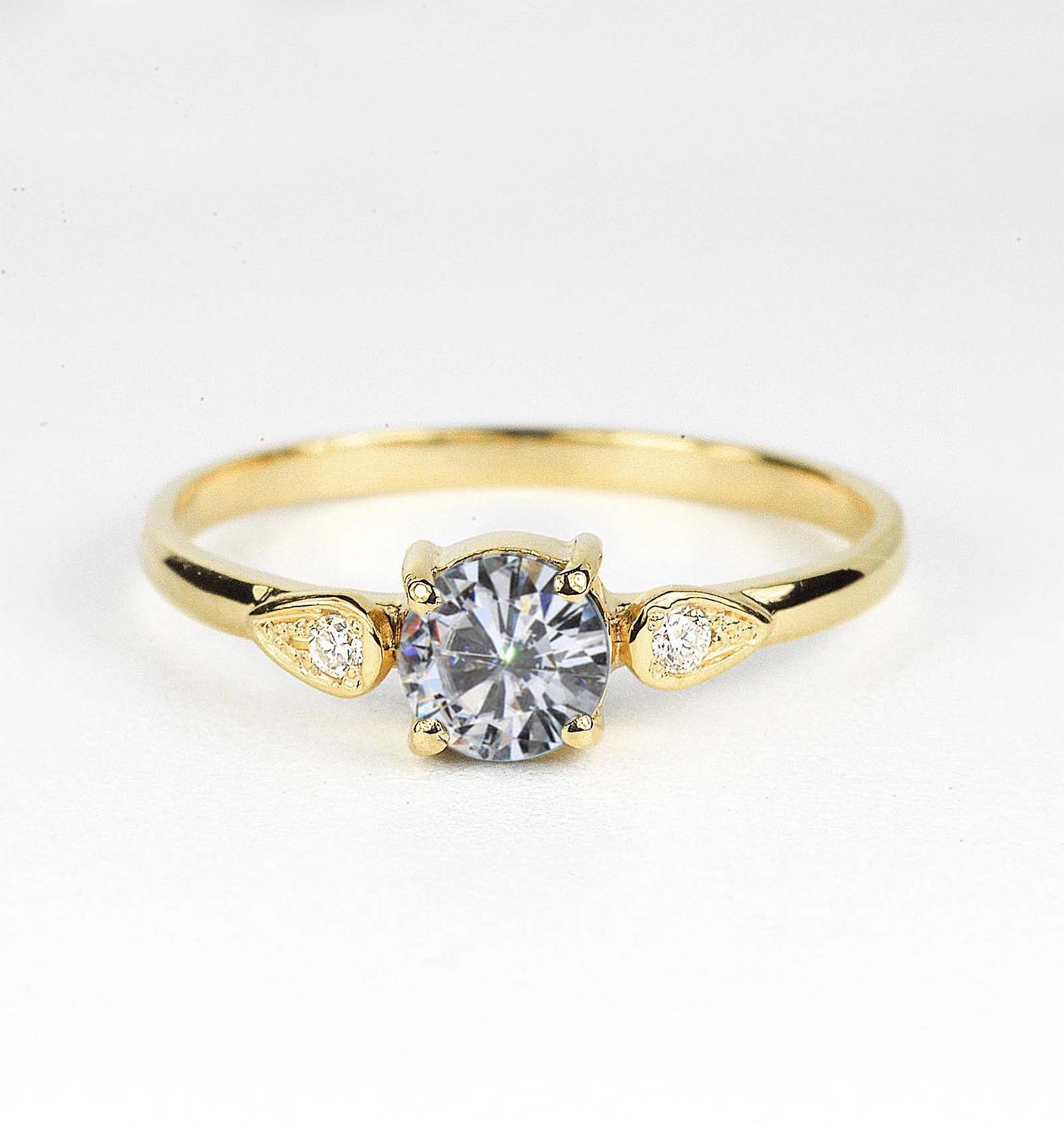 moissanite and diamond engagement ring