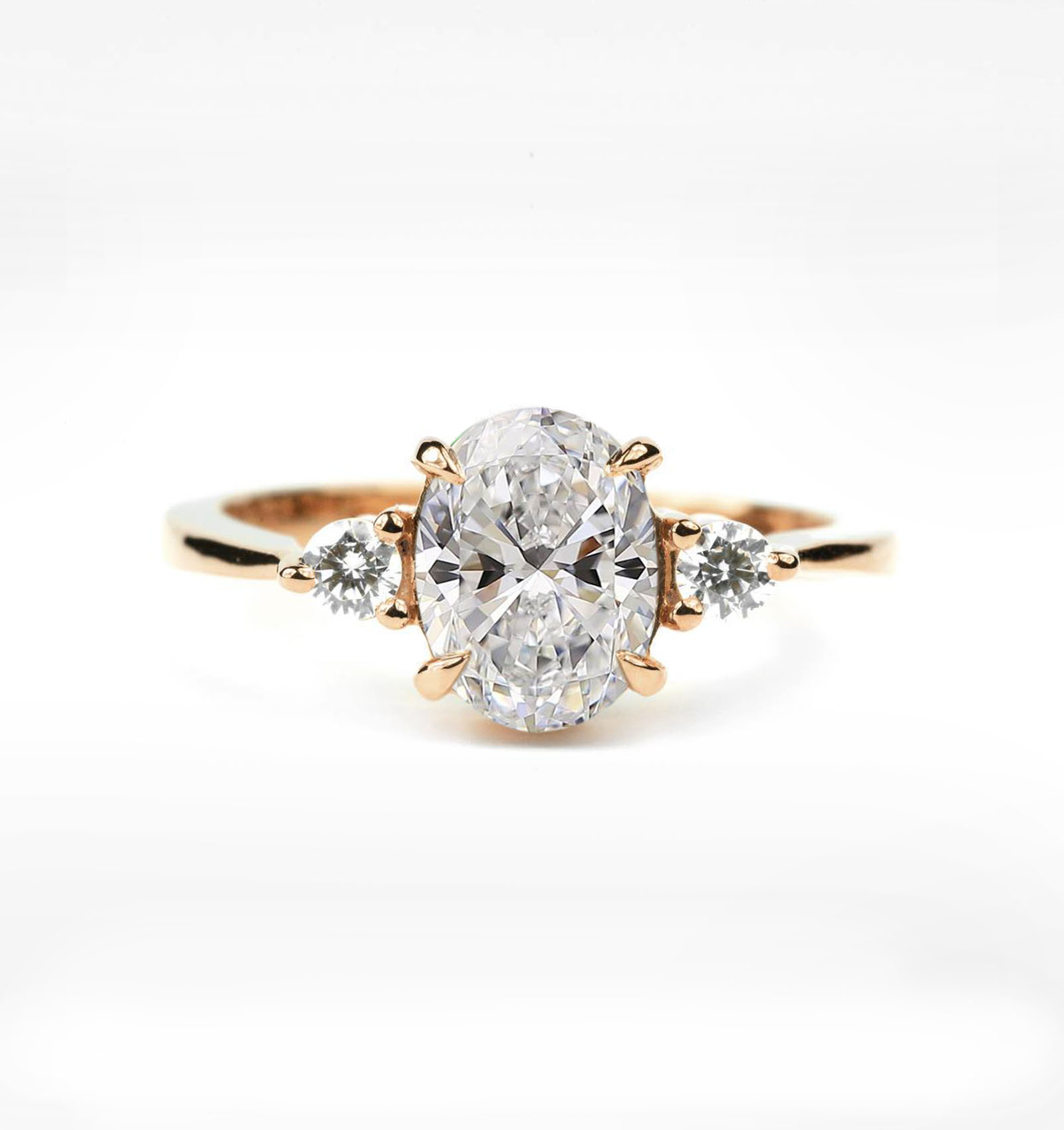 oval white moissanite and diamond ring