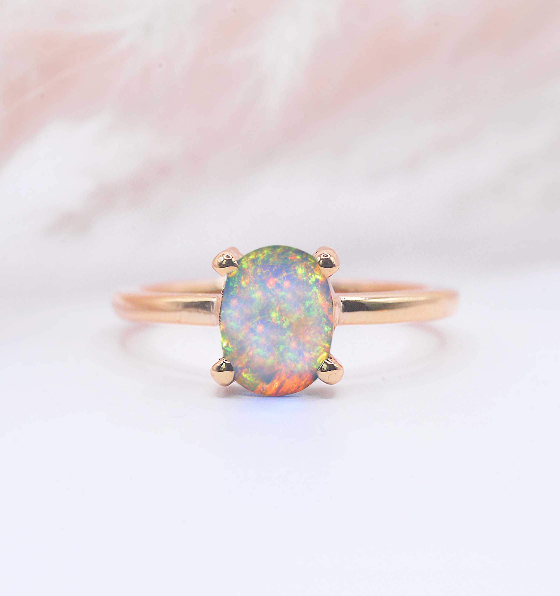 oval white opal art deco engagement ring
