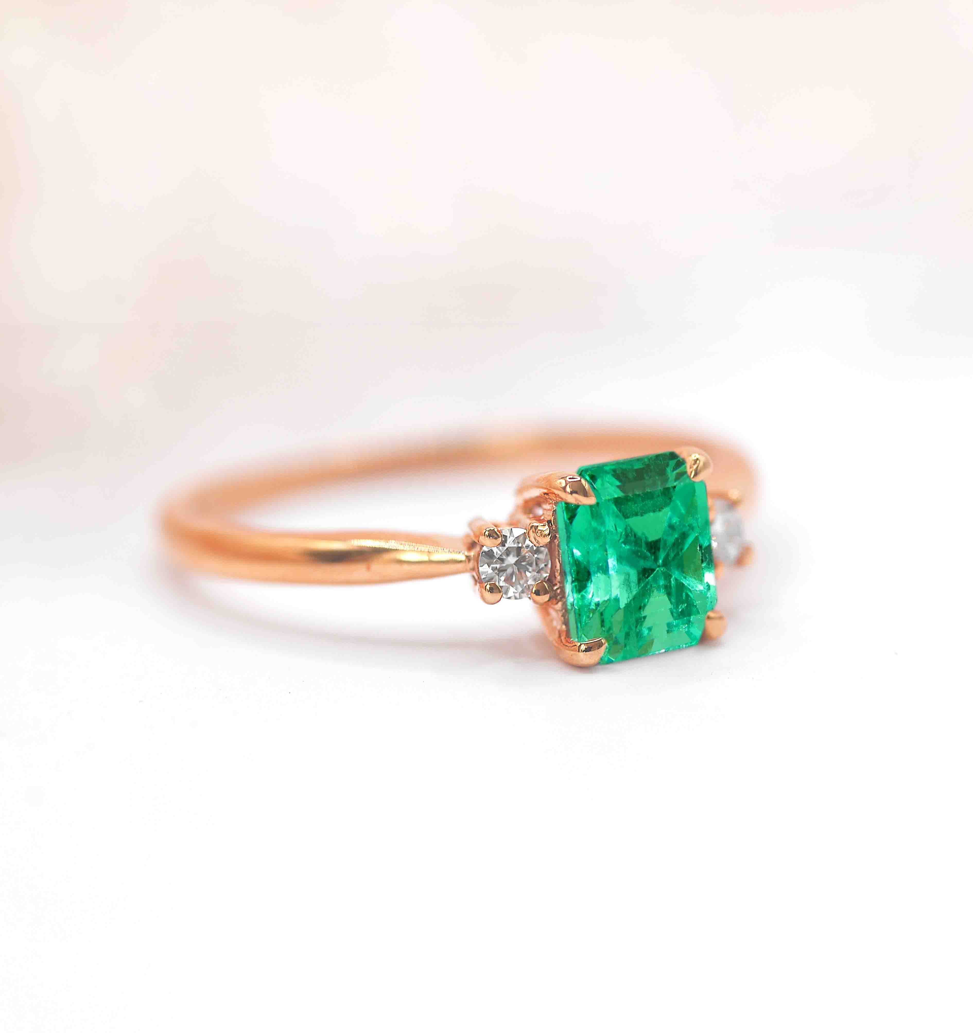radiant cut emerald art deco engagement ring