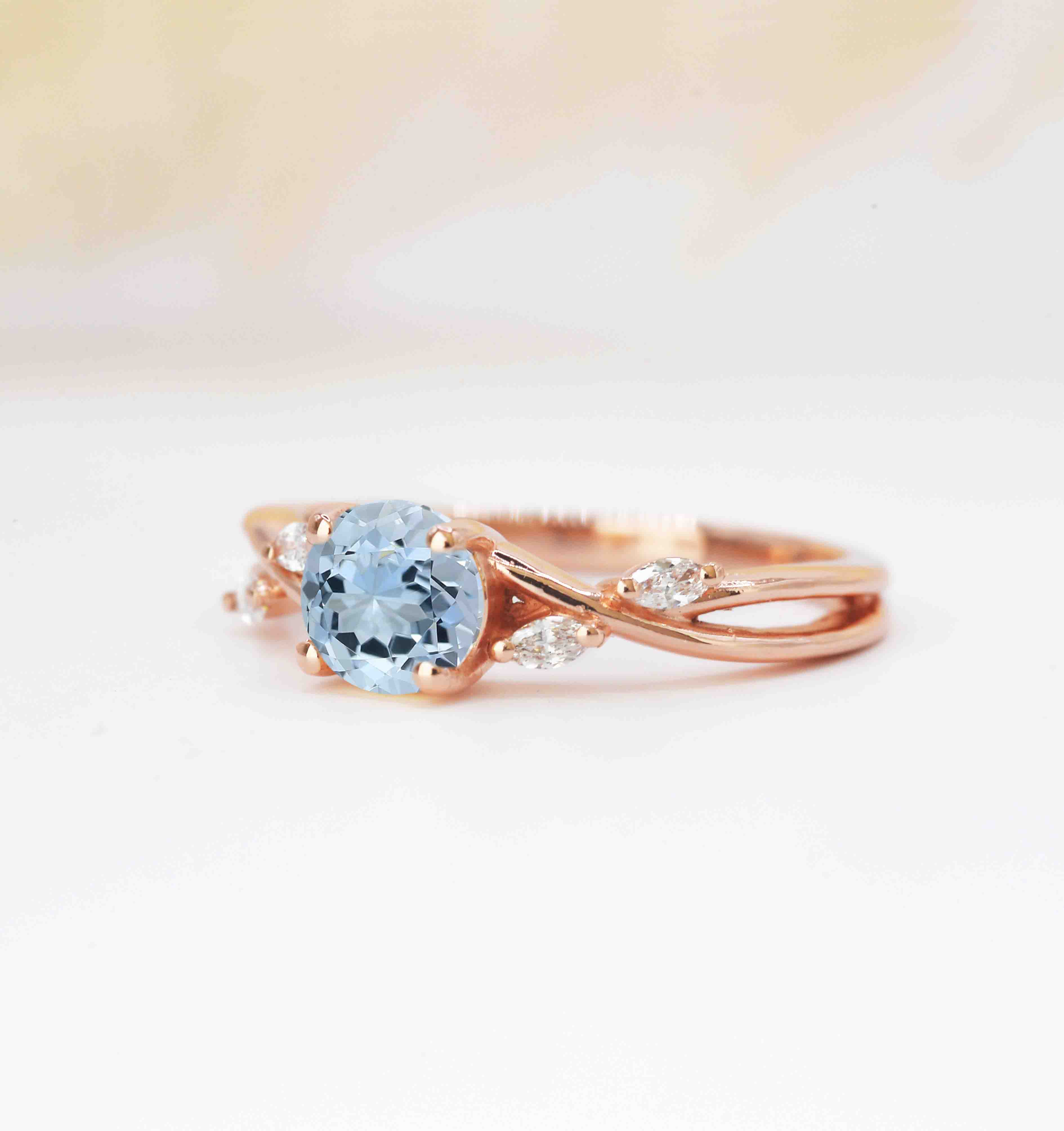 round aquamarine and diamond promise ring