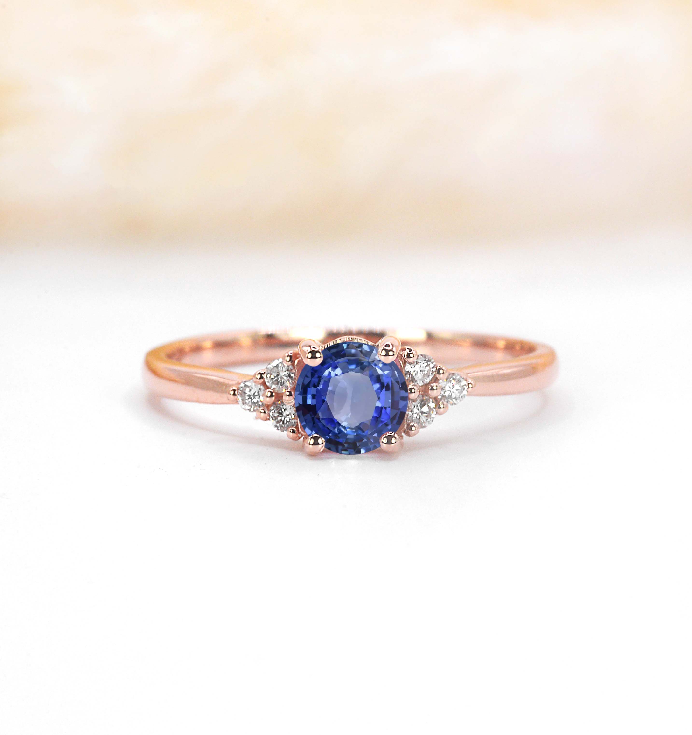 blue sapphire and diamond cluster ring for her