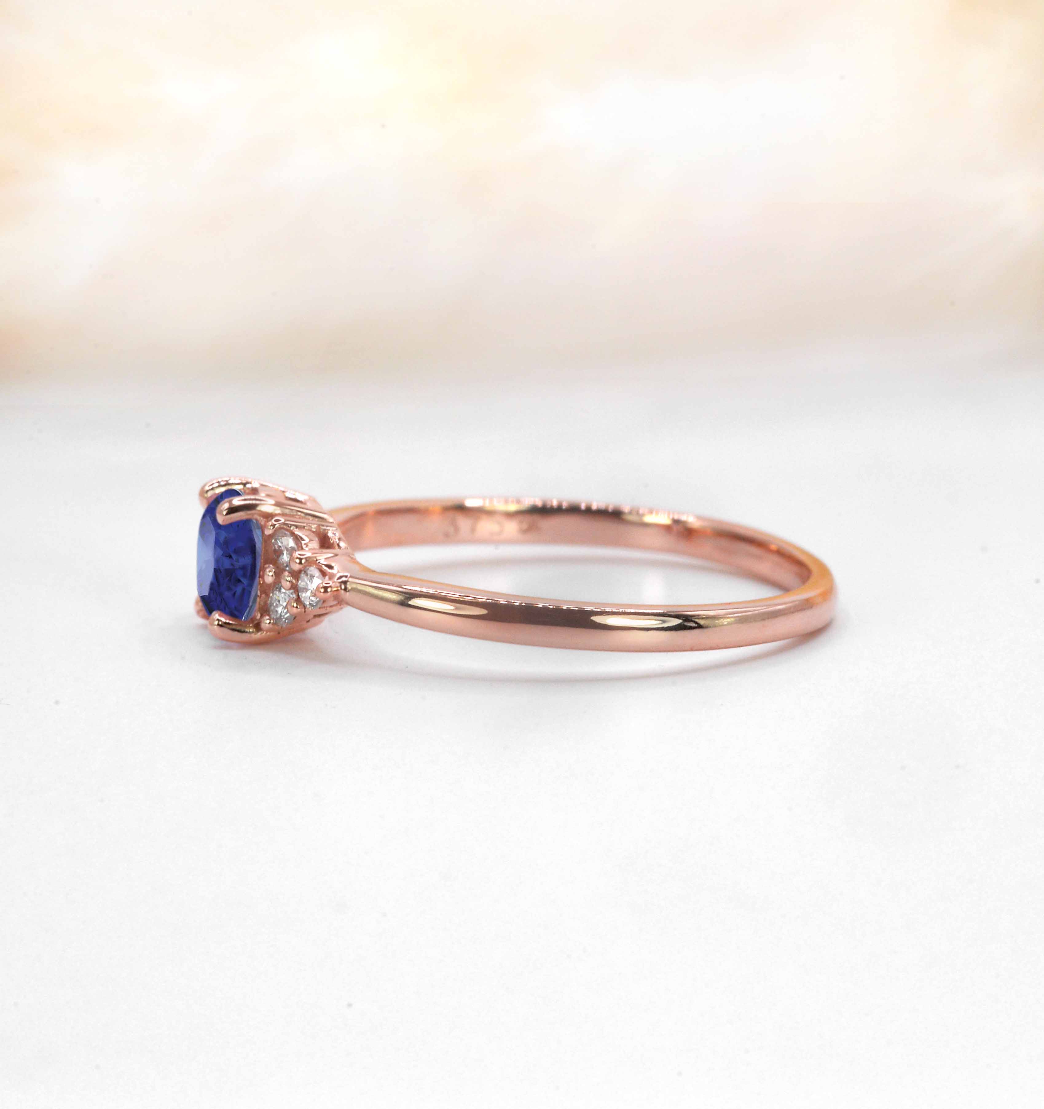 blue sapphire and diamond cluster ring for her