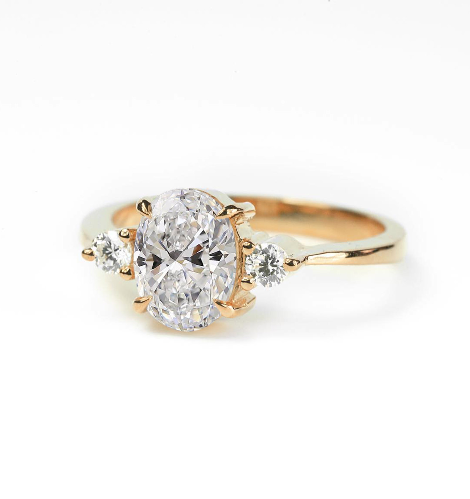 oval white moissanite and diamond ring