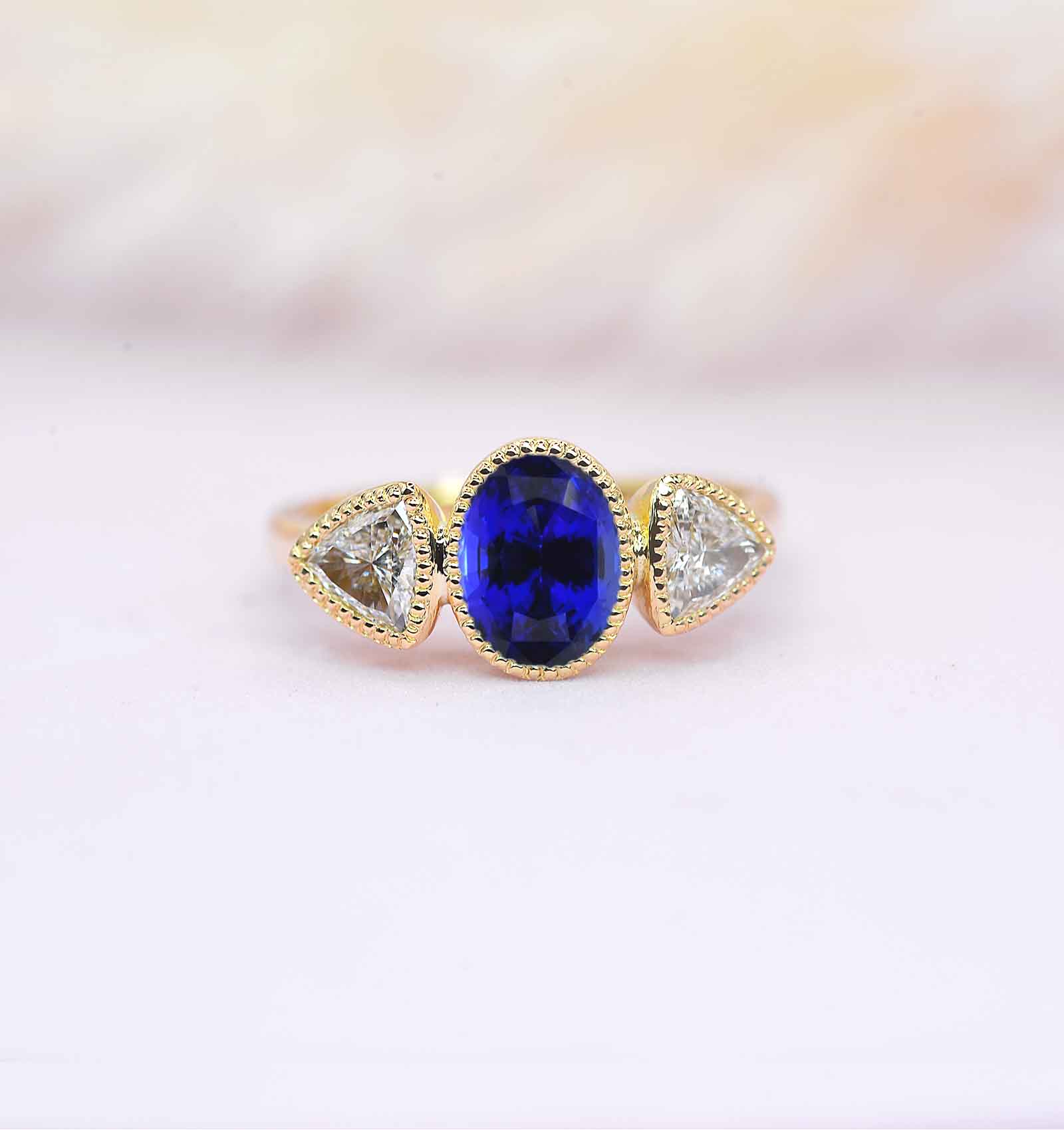 oval blue sapphire engagement ring