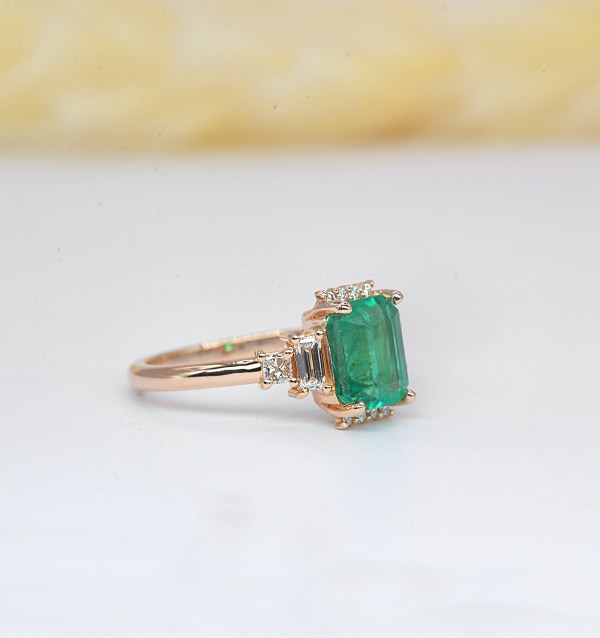 emerald high engagement ring