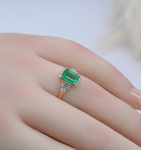 emerald high engagement ring