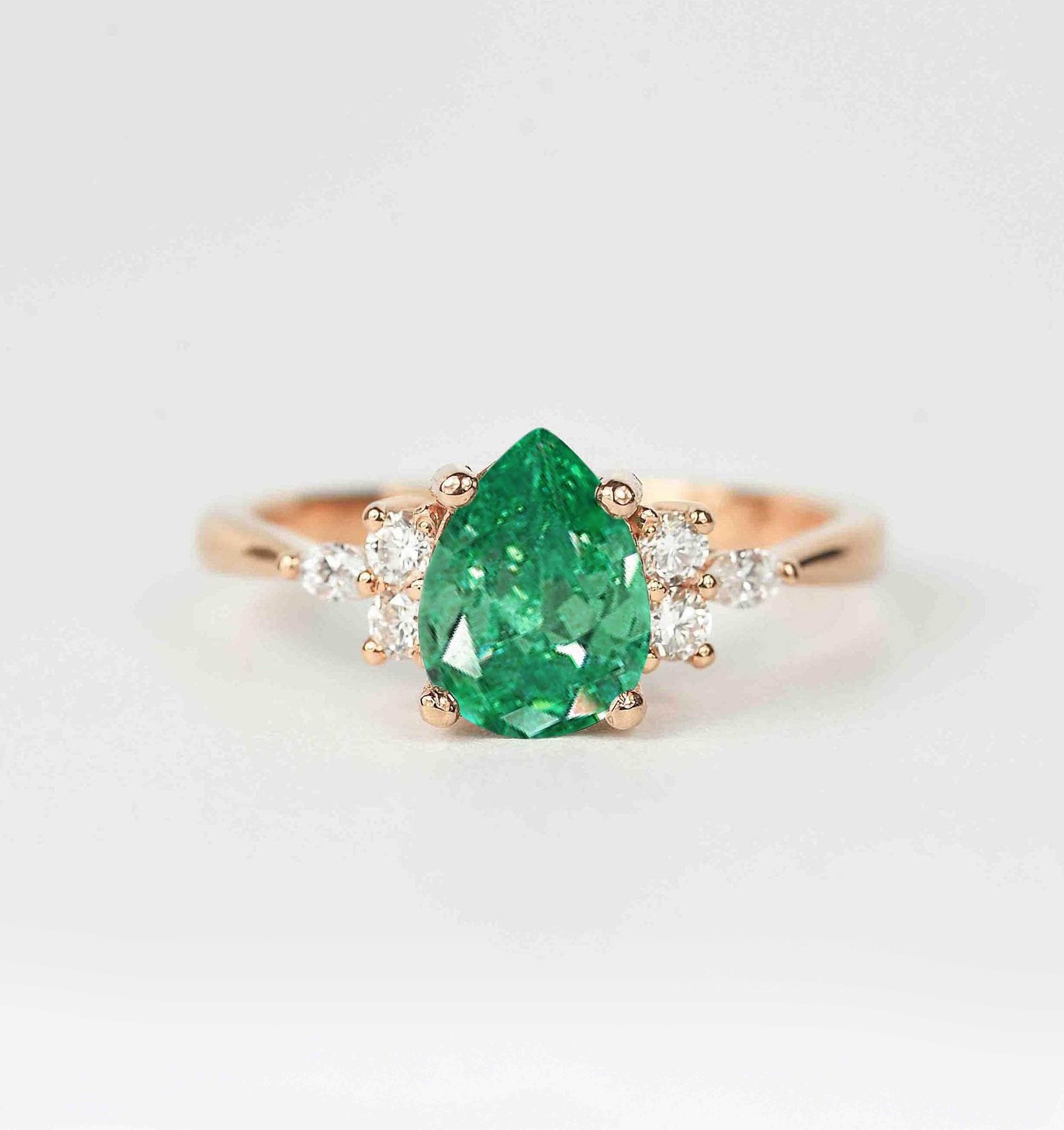 pear emerald and diamond promise ring
