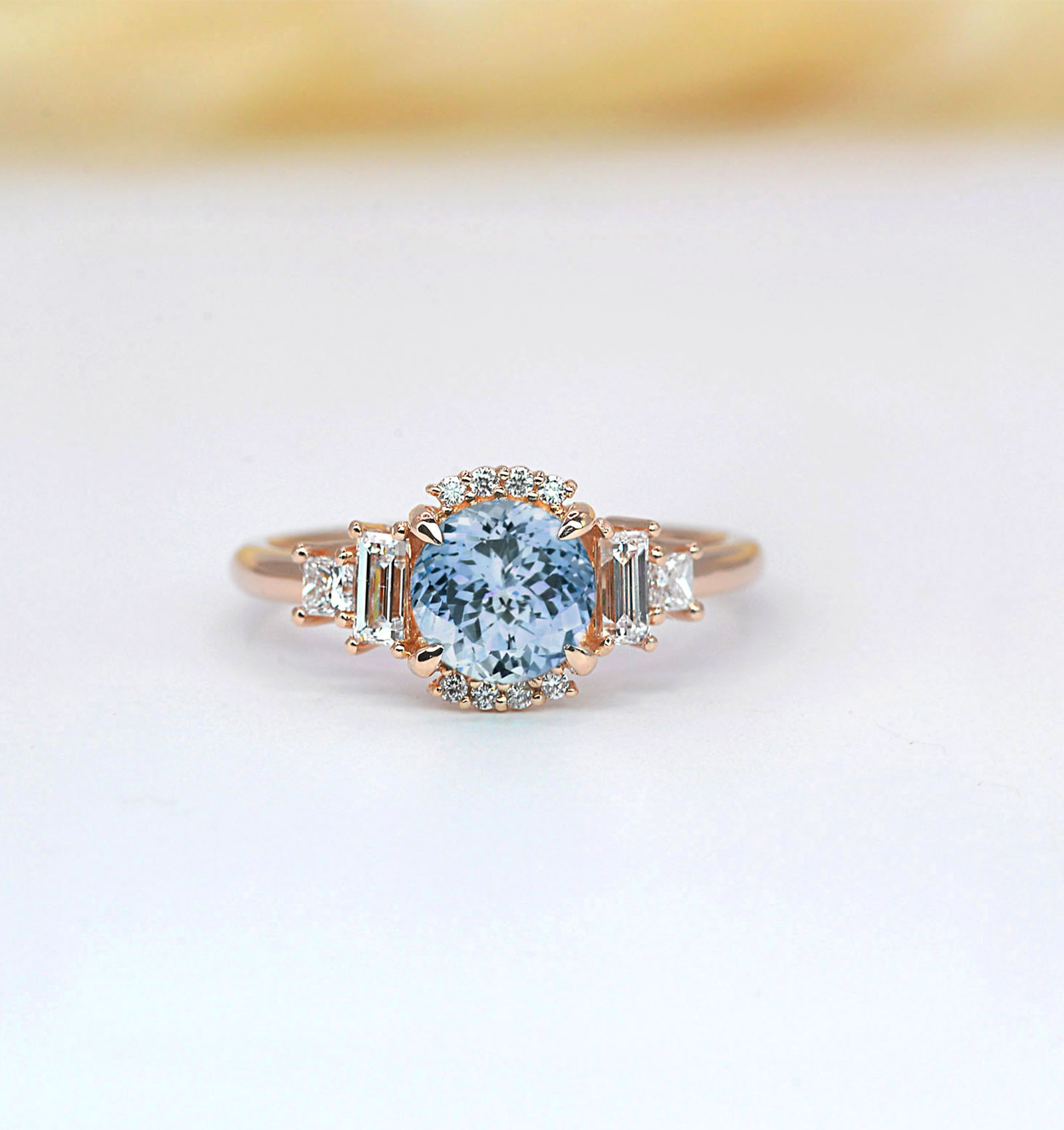 delicate aquamarine and diamond ring