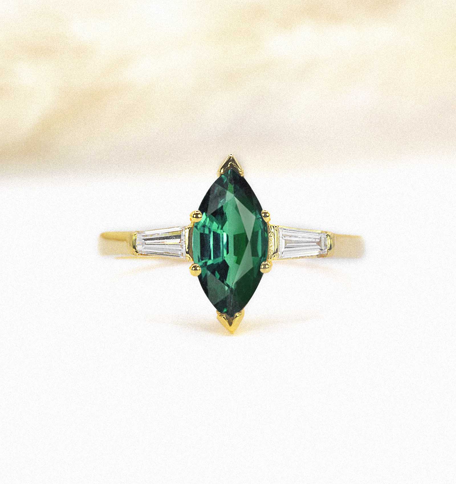 green three stones ring