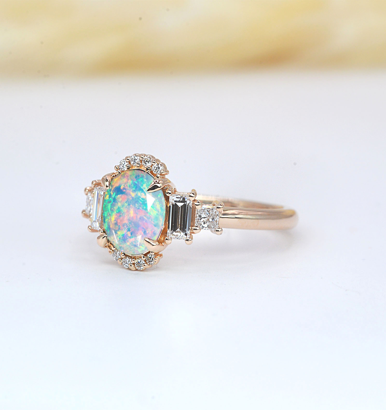 halo opal and diamond ring