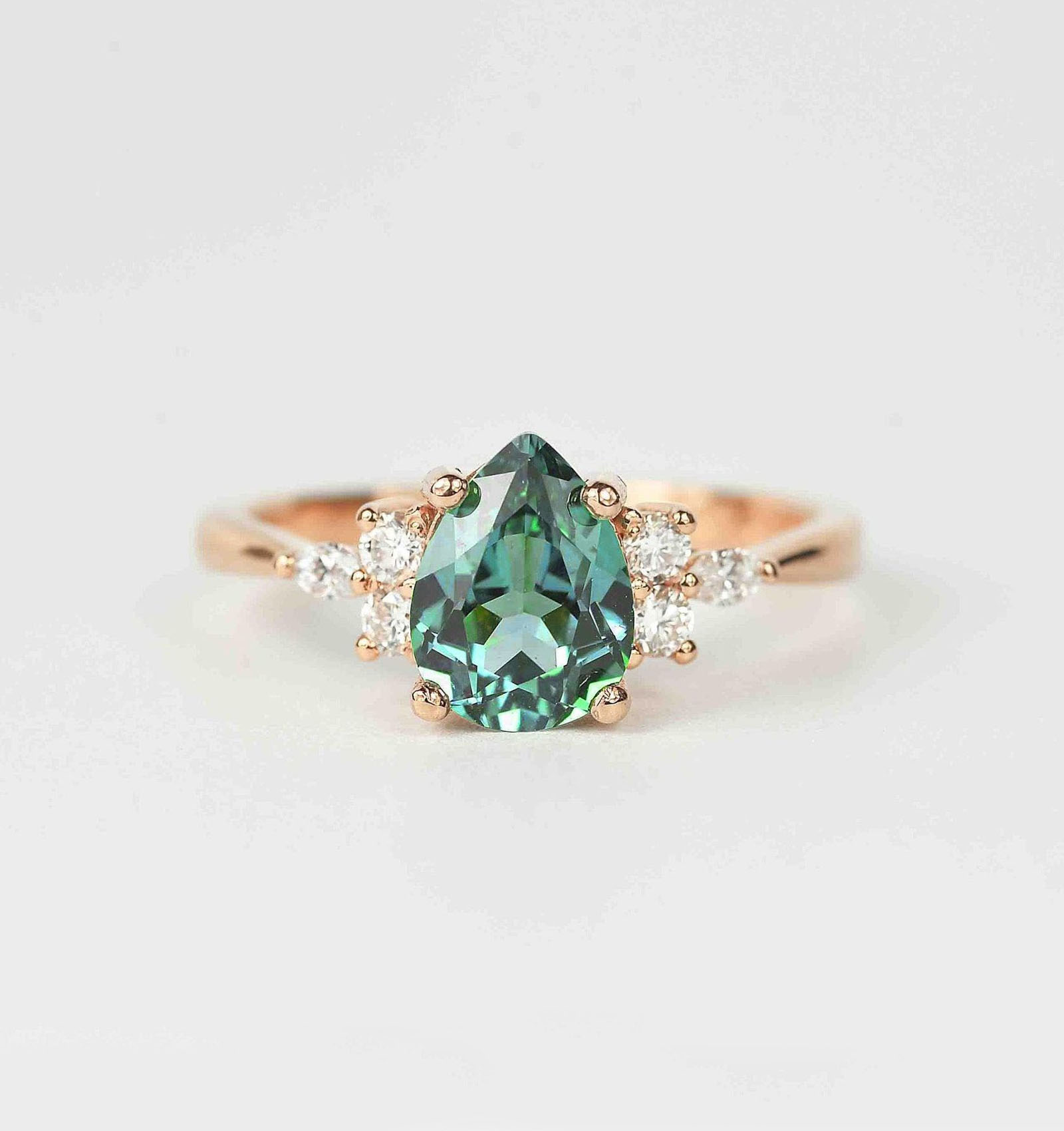 pear teal sapphire ring