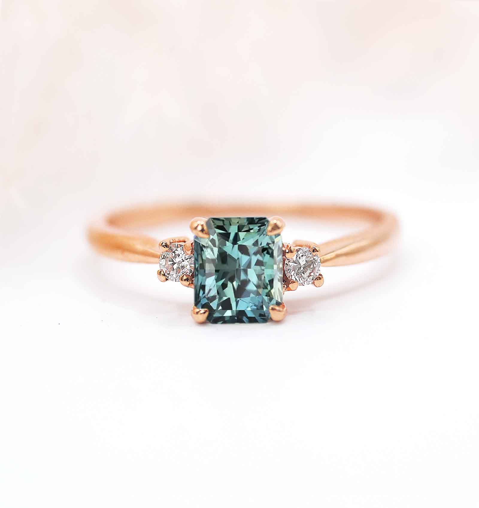 radiant teal sapphire bridal ring