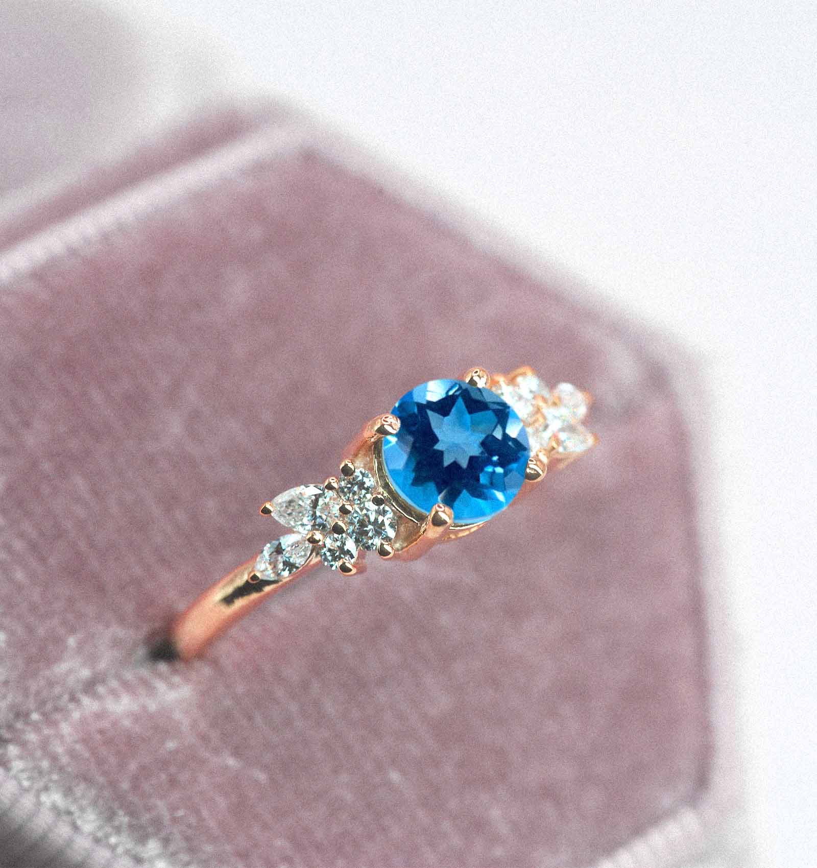 blue topaz celebrity engagement ring