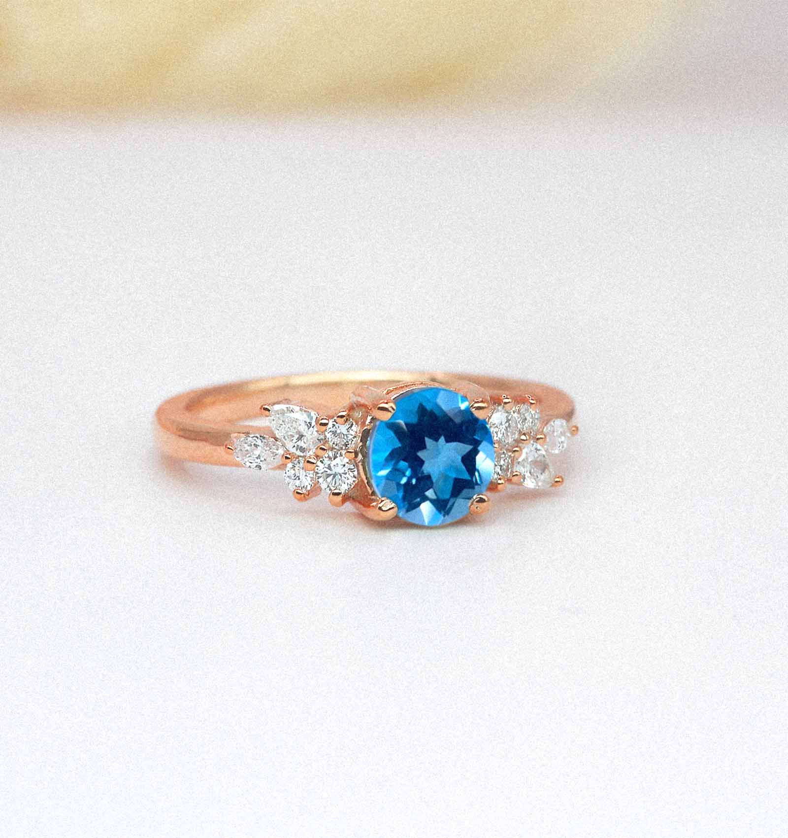 blue topaz celebrity engagement ring