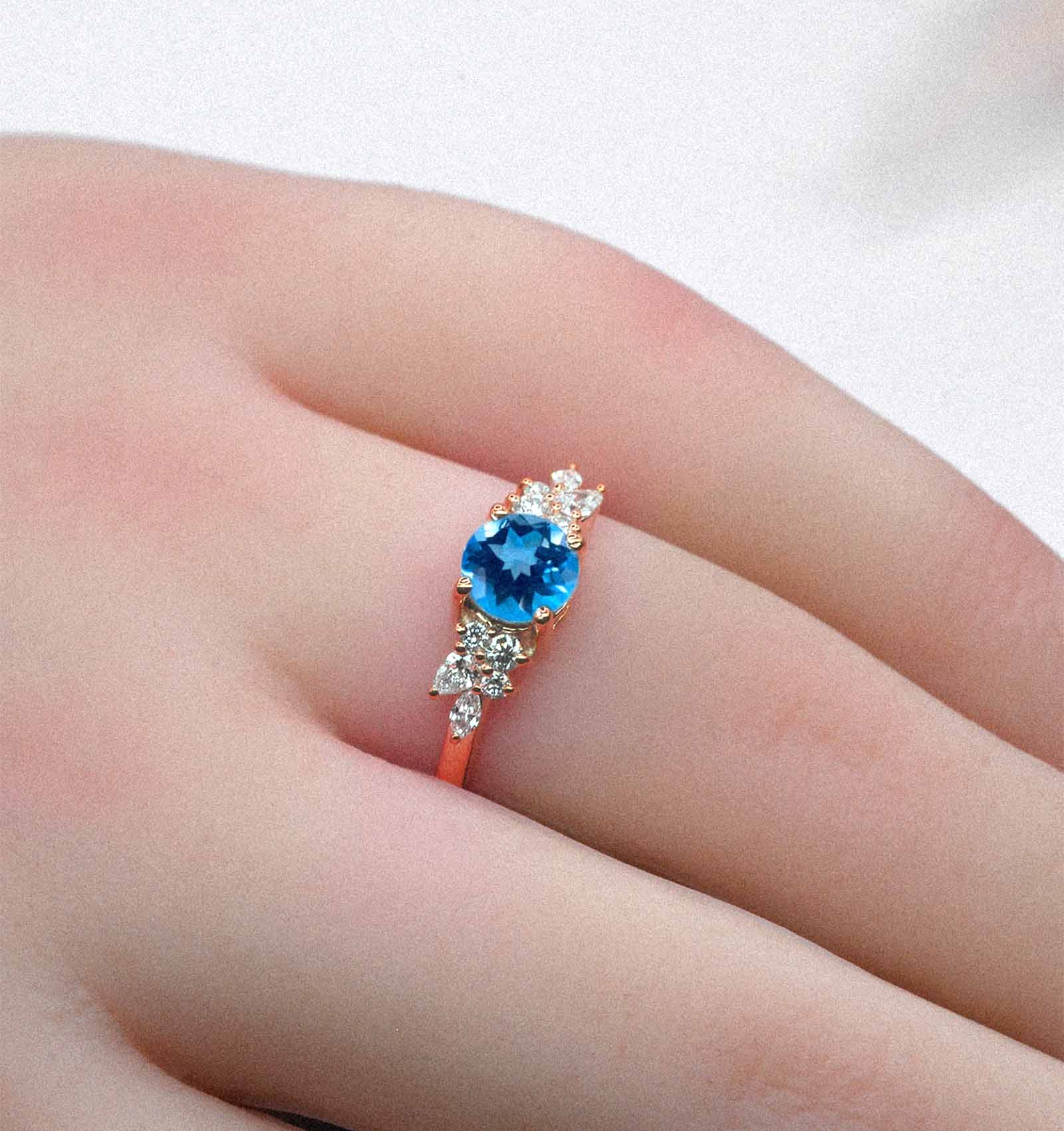 blue topaz celebrity engagement ring