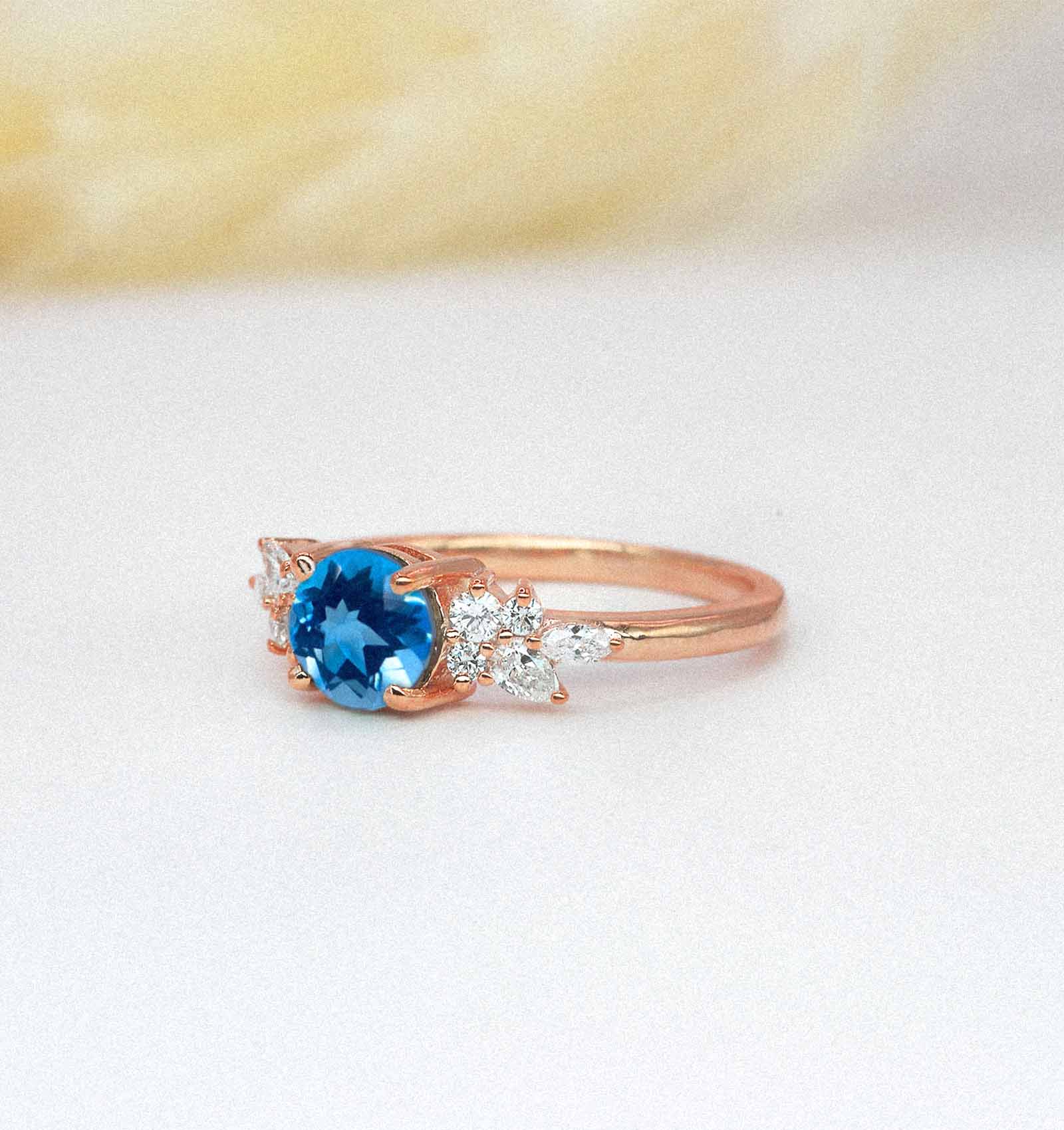 blue topaz celebrity engagement ring