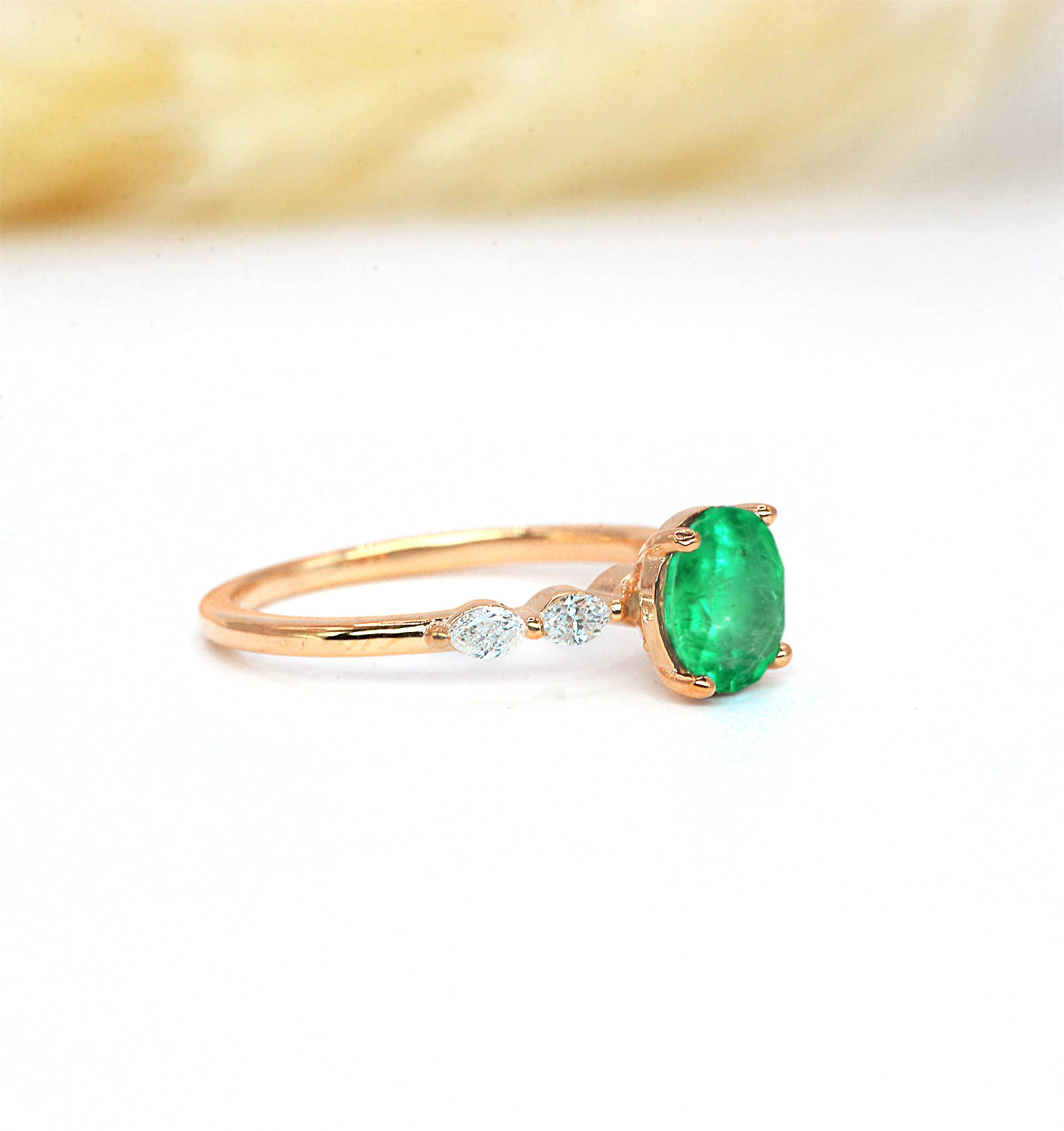 1.03ct emerald and diamond engagement ring